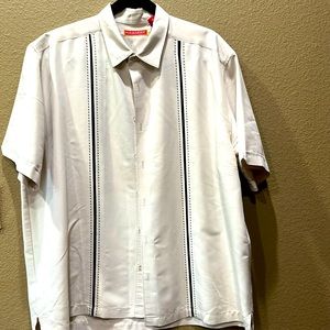 XL short sleeve shirt. Cream with black stripe down both sides of the front.